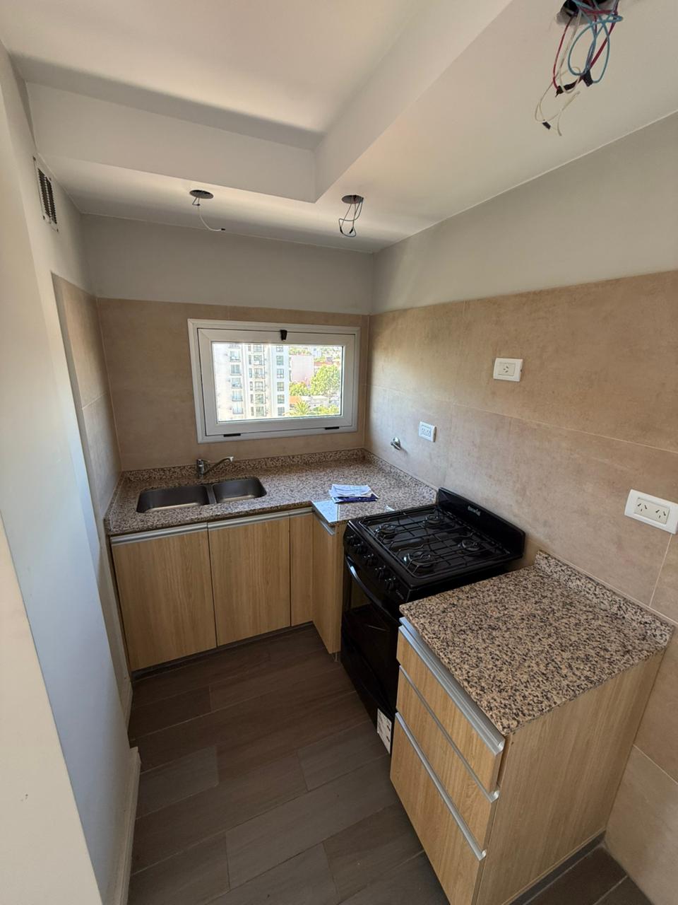 aparopropiedades - Departamento de 2 ambientes con cochera 